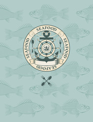 emblem with the sailboat, wheel and anchor