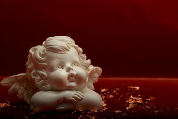 Christmas angel with red background