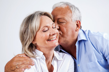 Husband Kissing Wife on Cheek