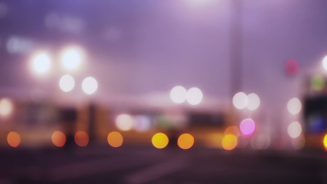 Defocused city lights at intersection