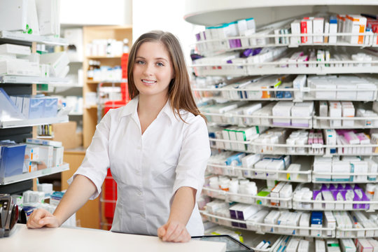 Female Pharmacist Standing at Counter