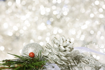 Fototapeta na wymiar Winter holiday background with silver ornaments
