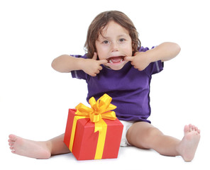 Joyful boy with present box