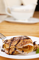 Crepes with chocolate sauce