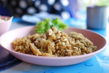 Spicy salad of fried minced fish