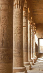 Colonnade with Egyptian carving in Philae temple, Egypt