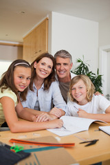 Fototapeta premium Family doing homework together