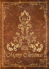 leather background with golden floral christmas decorations