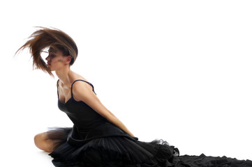 dynamic shot of a female ballet dancer shaking her hair and thro