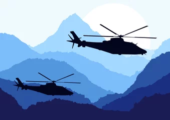  Legerhelikopters op de achtergrond van het berglandschap © kstudija