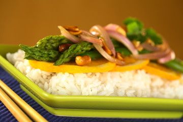 Green asparagus Thai-style served on rice