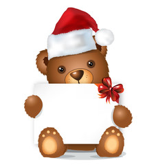 brown christmas bear with card sitting