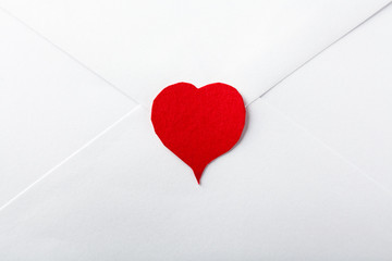 Red Paper Heart on White Envelope