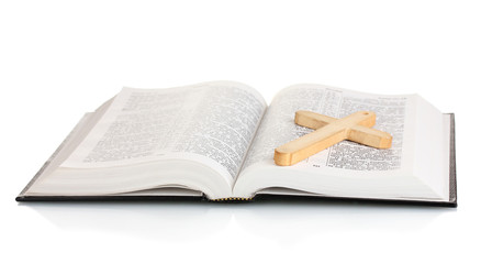 Russian bible and wooden cross isolated on white