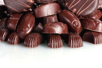 Many different chocolate candy isolated on white
