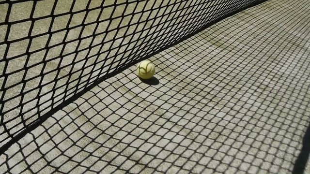 Tennis - Ball Flies in Net