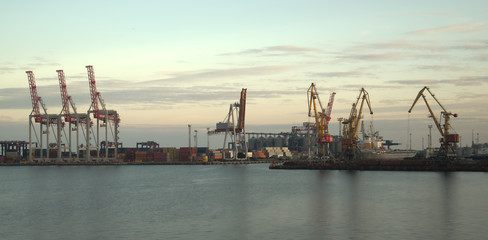 Fototapeta na wymiar Cranes and containers at a port 2