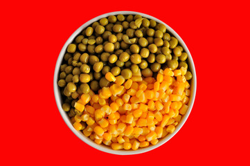 corn and peas on red