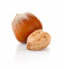 hazelnut in shell and without isolated on white background