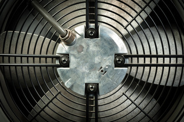 A turbine behind black bars