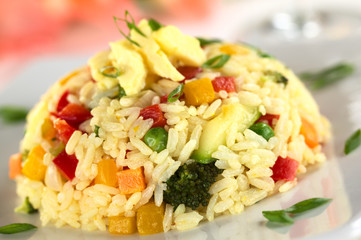 Vegetable risotto with scrambled egg on top