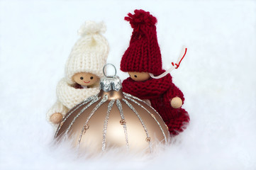 brown christmas bauble with puppets