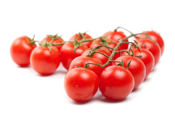 Wet Cherry tomatoes on white