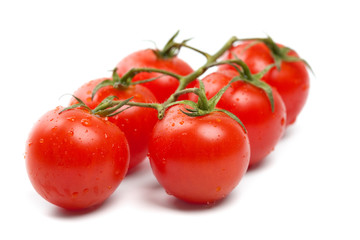 Wet Cherry tomatoes on white