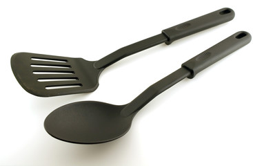 Black plastic kitchenware over white