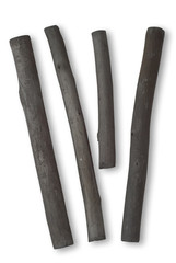 Four Sticks of Charcoal on White