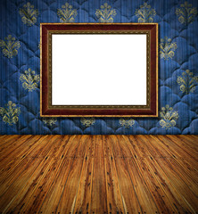 old style vintage golden frame on blue stitched textile decorate