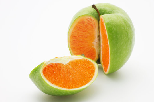 Apple containing an orange