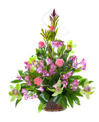 Bright flower bouquet in basket isolated over white background