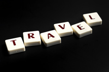 Travel word made by letter pieces