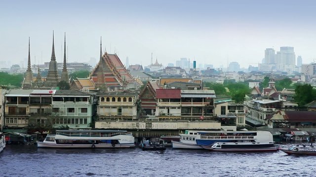Bangkok river from wat phraya. Grand palace is seen