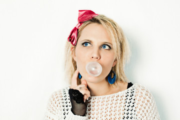 1980s girl blowing bubble gum
