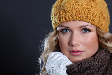 Portrait of beautiful woman wearing winter accessories