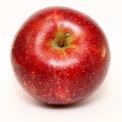 Juicy red apple on white background