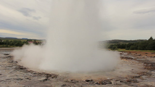 Eruption of Iceland's largest geyser "Strokkur" (wide shot)