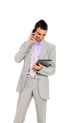 young business man standing using a tablet