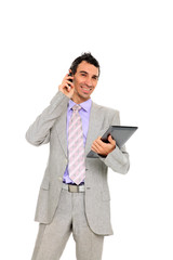 young business man standing using a tablet