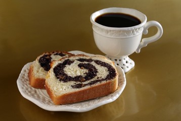 slices of poppy-seed cake and cup of coffee