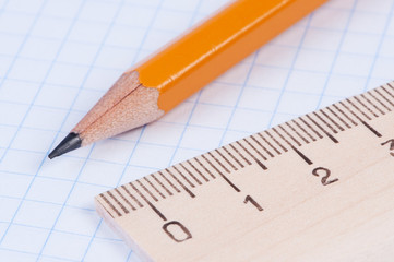Pencil and ruler closeup.