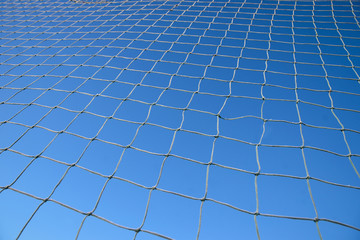 Net on blue sky