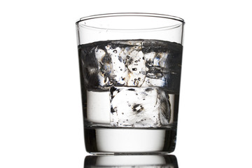 Glass of water with ice cubes