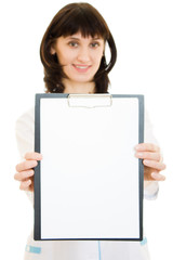 Naklejka premium Woman doctor with an advertising tablet on a white background.