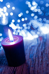 candela viola con luci