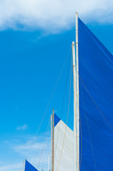 white and blue sail