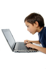 Boy with laptop isolated on white background