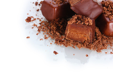 Сhocolate candy covered with chocolate shavings isolated